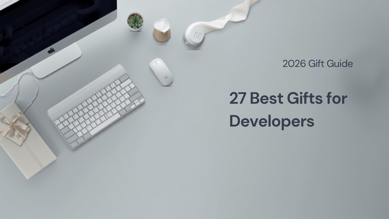 Best gifts for developers 2026 — a tidy desk setup with a monitor, low-profile keyboard, mouse, headphones, a small plant and a wrapped gift